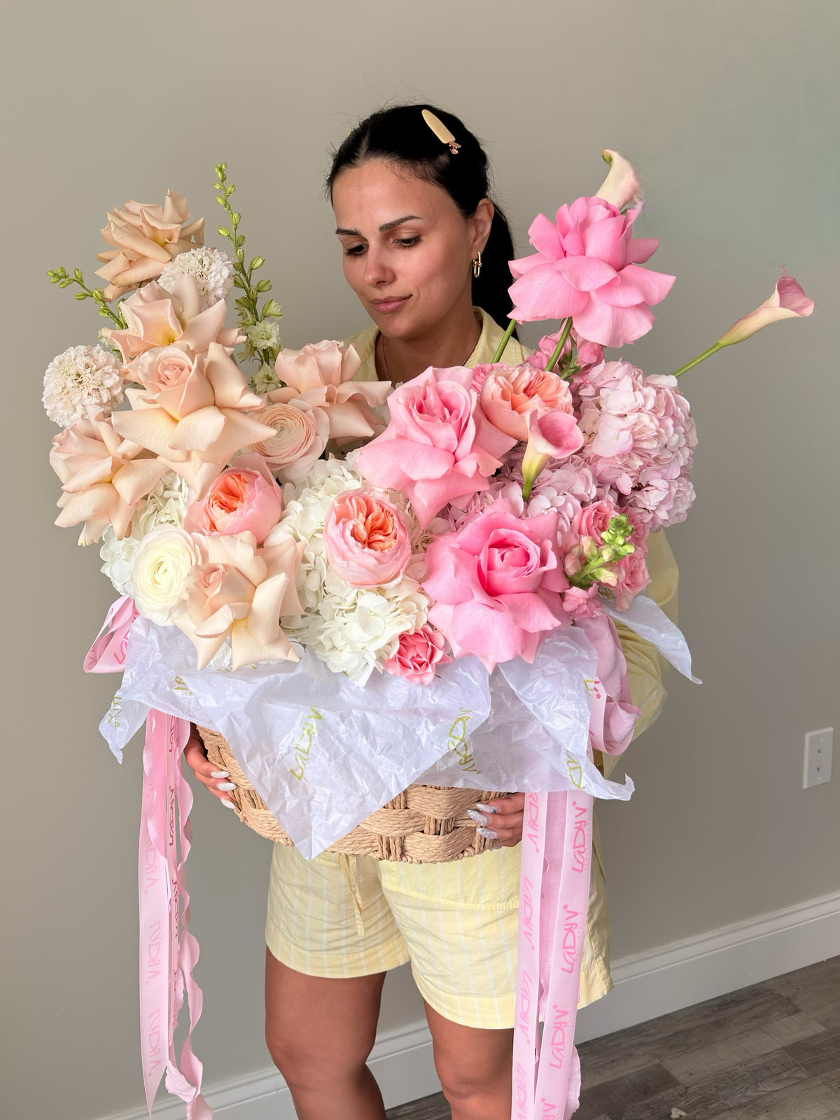 FLOWER BASKET “BLUSH AFFAIR” — ROSES, GARDEN ROSES, HYDRANGEA, RANUNCULUS, CALLA LILIES & SEASONAL ACCENTS