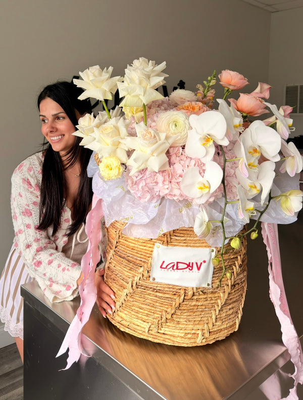 FLOWER BASKET “THE LADY V” — PREMIUM ROSES, HYDRANGEAS, PHALAENOPSIS ORCHIDS, RANUNCULUS, CALLA LILIES & SEASONAL ACCENTS