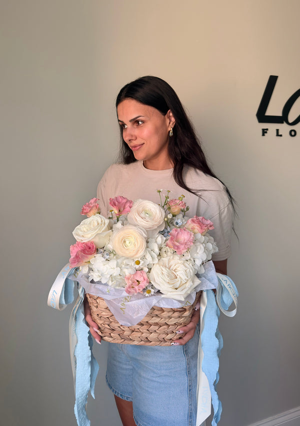 FLOWER BASKET “CLOUD NINE” — ROSES, HYDRANGEA, RANUNCULUS & SEASONAL BLOOMS